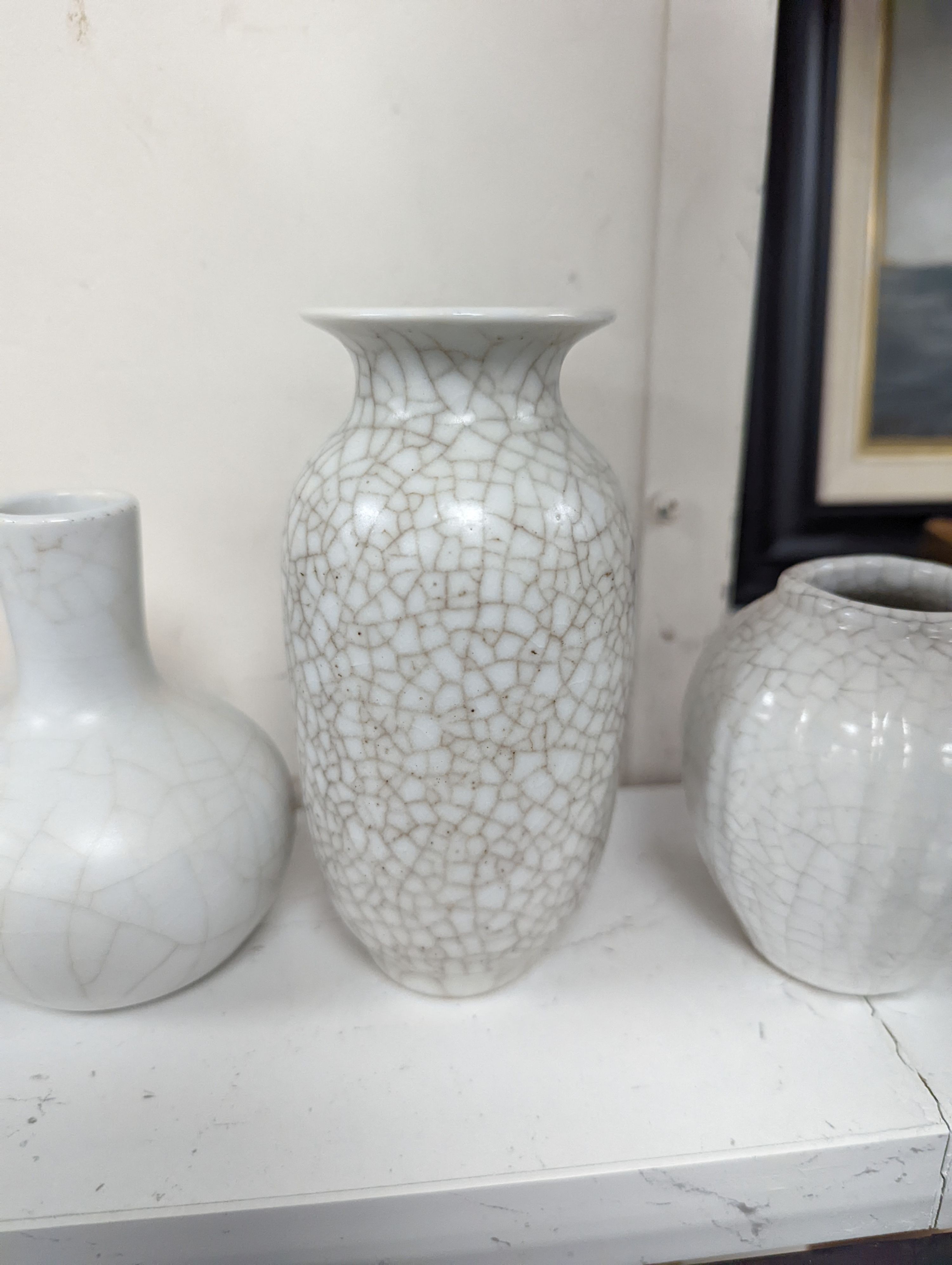 Four Chinese crackle glaze vases, tallest 16 cms high.